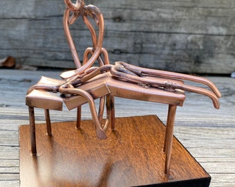 Copper Art Figurine of a chiropractor