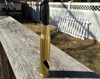 50 caliber bottle opener with Sharpie marker