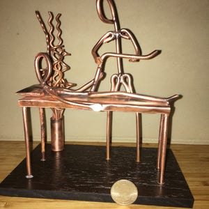 Large Copper figurine of a physical therapist / chiropractor