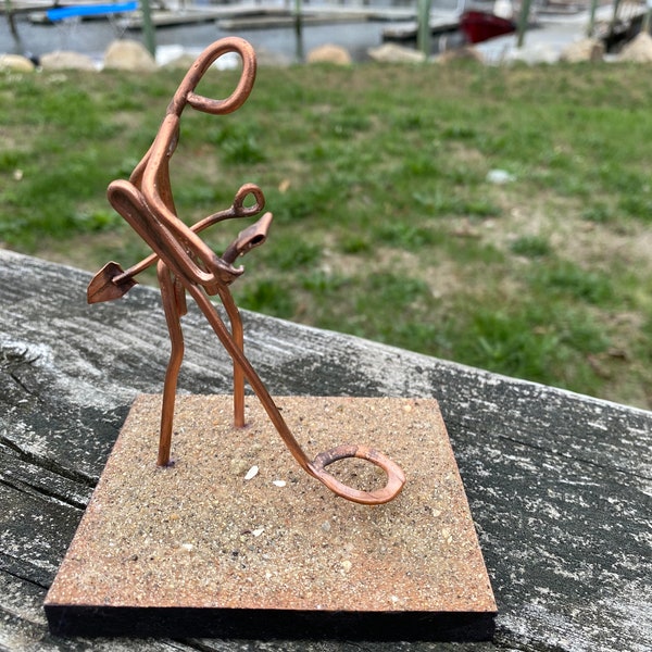 Copper Art Figurine of a treasure hunter , metal detector