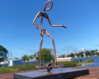 Figura de arte de cobre Una rueda