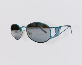 FIORUCCI oval sunglasses with pigeon blue metal frame and heart detail vintage 80s