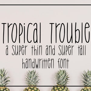 May include: A black and white image of the text "Tropical Trouble" with the tagline "a super thin and super tall handwritten font". The text is centred on a light pink background with four pineapples arranged in a row at the bottom of the image.