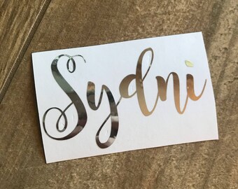 Pegatina de vinilo con efecto espejo y lámina plateada con nombre en cursiva