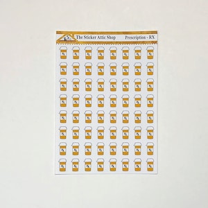 May include: Sheet of stickers featuring small, yellow prescription pill bottles with white lids and the Rx symbol. The text "The Sticker Attic Shop" and "Prescription - RX" are at the top.