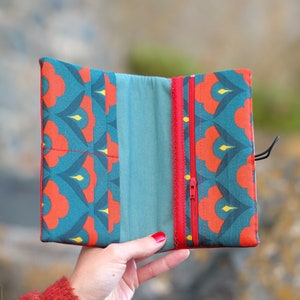 Cartera de acompañante para mujer Clotilde en piel sintética de color rojo brillante con tejido estampado en rojo
