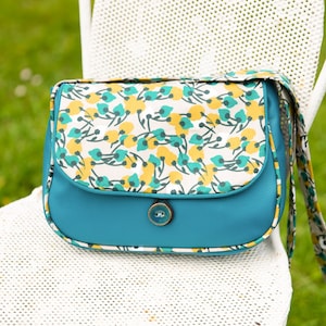 Sac bandoulière femme REVERSIBLE Mia en simili cuir bleu turquoise canard et tissu imprimé feuilles moutarde