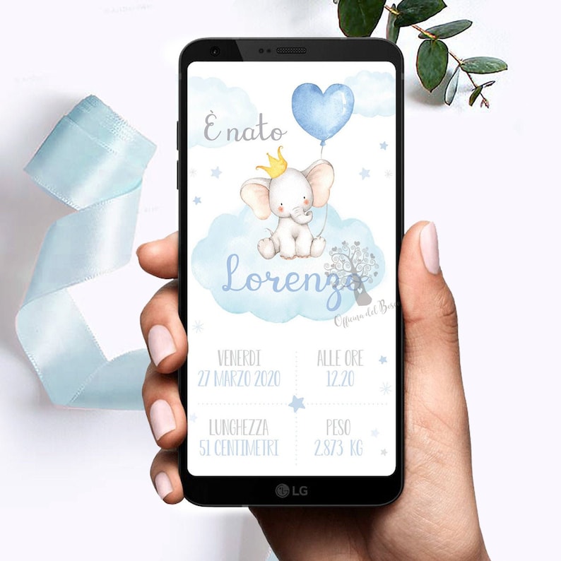 May include: A blue and white baby announcement card featuring a cartoon elephant holding a blue heart balloon. The card reads "E' nato Lorenzo" and includes the baby's birth date, time, length, and weight.