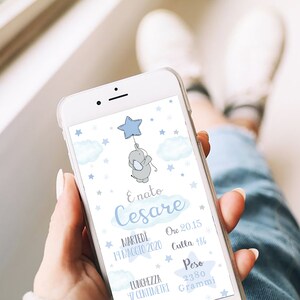 May include: A blue and white phone screen with a cartoon elephant holding a blue star balloon. The text on the screen reads "E' nato Cesare", "Marted&igrave; 19 Maggio 2020", "Ore 20.15", "Culla 486", "Lunghezza 47 Centimetri", "Peso 2380 Grammi".