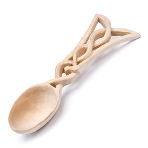 BeaverCraft whittling tools and materials for making a handmade wooden spoon.