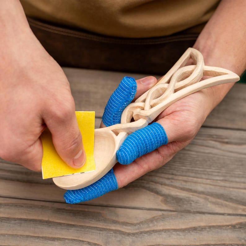 Complete whittling kit for crafting a traditional Celtic love spoon at home.