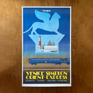 May include: Vintage travel poster for the Venice Simplon Orient Express. The poster features a blue winged lion, Venetian landmarks, and a blue train. The text at the bottom reads "Venice Simplon Orient-Express" with the cities London, Paris, Milano, and Venezia.
