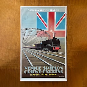 May include: Vintage travel poster for the Venice Simplon Orient Express, featuring a black steam train on tracks. The poster includes the text "Victoria Station London" and the Union Jack flag. The train is depicted under a stylized arched roof.