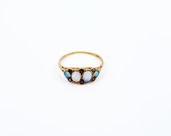 1890s Victorian Cabochon Cut Iridescent Opal and Seed Pearl 10K Gold Ring