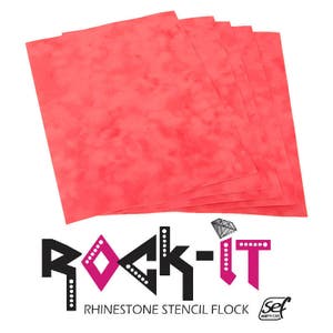 May include: A stack of six sheets of red rhinestone stencil flock. The flock is a soft, fuzzy material that is used to create designs with rhinestones. The flock is labeled "Rock-It Rhinestone Stencil Flock" and has a logo for "sef americas".