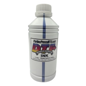May include: A white plastic bottle with a blue stripe down the side. The bottle is labelled with the text "PerfecPressHTI.com", "DTG", "DIRECT TO FILM", "INK", "1 Litre - Shake before using", and "1500 Beaver Ridge Circle, Suite D, Norcross, GA 30071".