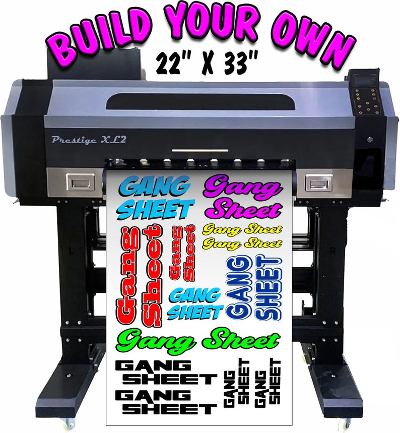 May include: A large format printer with a roll of vinyl printed with the words "Gang Sheet" in various colors and fonts. The printer is labeled "Prestige XL2" and the text "Build Your Own 22" x 33" is displayed above the printer.