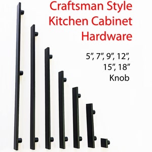 May include: Black metal cabinet hardware pulls in various sizes, including 5 inches, 7 inches, 9 inches, 12 inches, 15 inches, and 18 inches.  The pulls are arranged in order of size, with the smallest pull on the right and the largest pull on the left.  The text "Craftsman Style Kitchen Cabinet Hardware" and "5", 7", 9", 12", 15", 18" Knob" is displayed above the pulls.
