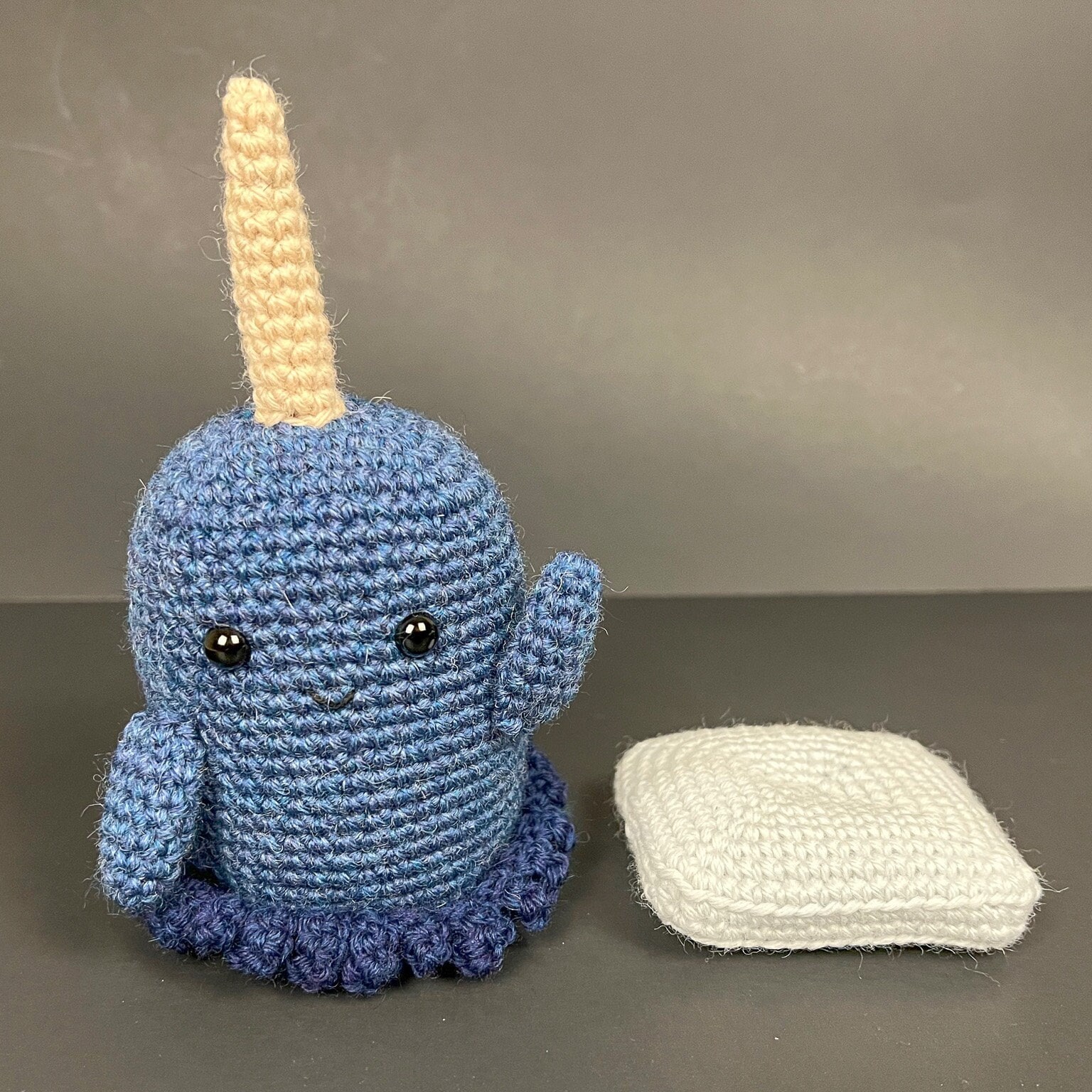 I added the eyes to my narwhal! it's my first amigurumi and it's looking  great! : r/crochet