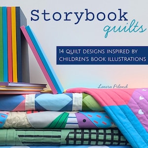 May include: A stack of colorful quilts with different patterns, including geometric shapes, stripes, and polka dots. The quilts are arranged in a pyramid shape, with the top quilt folded over the others. The text "Storybook Quilts" and "14 Quilt Designs Inspired by Children's Book Illustrations" is visible on the top of the image. The text "Laura Piland" is visible at the bottom of the image.