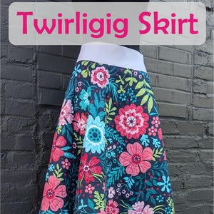 May include: A floral print skirt with a white waistband. The skirt features a dark background with large pink, blue, and green flowers. The text "Twirligig Skirt" is at the top, and a logo for "Slice of Pi Quilts" is at the bottom.