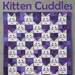 May include: A purple and white quilt with a checkerboard pattern of white kitten faces. The quilt is titled "Kitten Cuddles" and is made by "Slice of Pi Quilts".