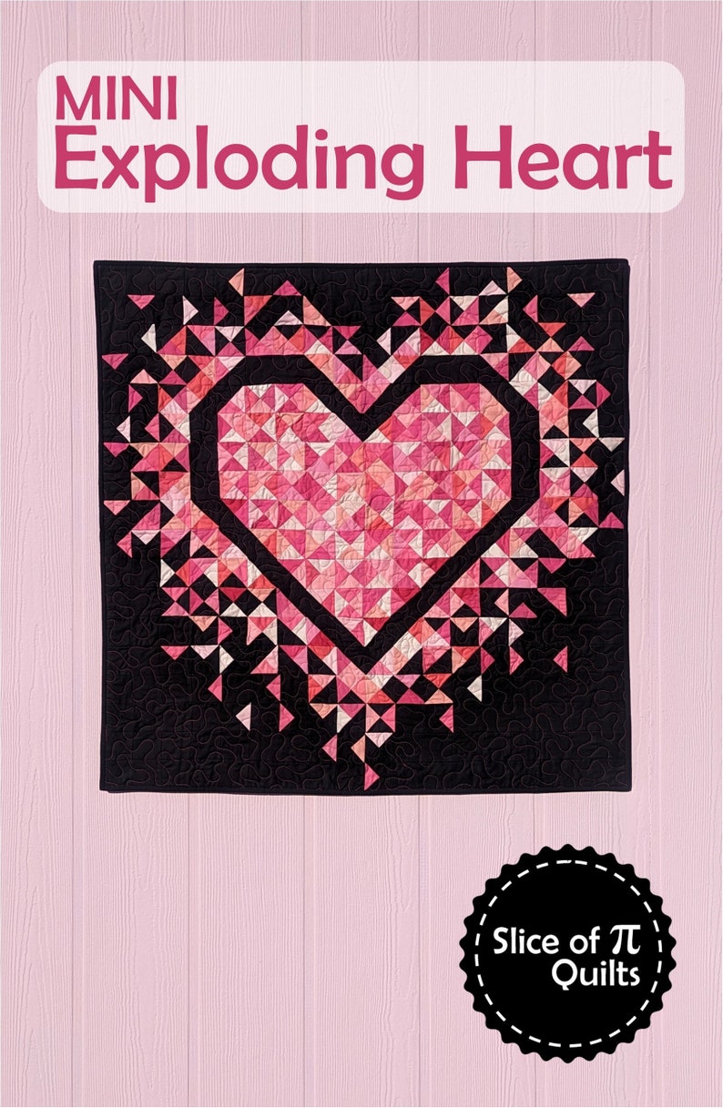 The Mini Exploding Heart quilt pattern cover with an all pink heart with a black background fabric hanging on a light pink wall