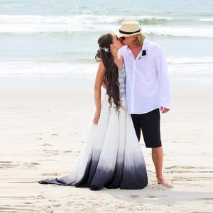 Lace tye dye wedding dress with train and bone on the back, black and white lace bodysuit with thin straps and low back with satin skirt