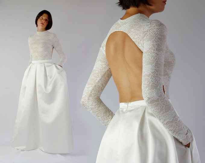 Open back lace top composed by a high neck lace top and a bridal skirt pockets