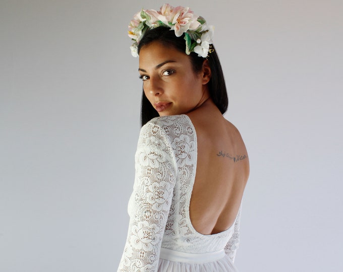 Lace bridal bodysuit with long sleeves and low back combined with a chiffon layered skirt