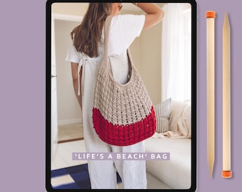 May include: A beige and red crocheted bag with the text "LIFE'S A BEACH BAG" displayed on a tablet screen. The bag has a woven texture and a long strap. The words "DOWNLOADABLE INSTRUCTIONS" and "Lauren Aston Designs" are also visible.