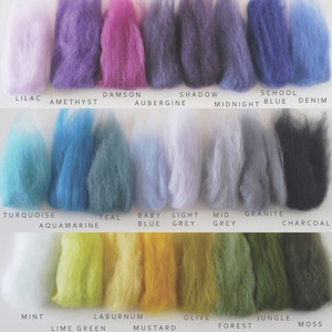 May include: A color chart of wool yarn samples in various shades of purple, blue, grey, green, and yellow. The colors are labeled with names like Lilac, Amethyst, Damson, Turquoise, Teal, Baby Blue, Light Grey, Mid Grey, Granite, Charcoal, Mint, Lime Green, Laburnum, Mustard, Olive, Forest, Jungle, and Moss.