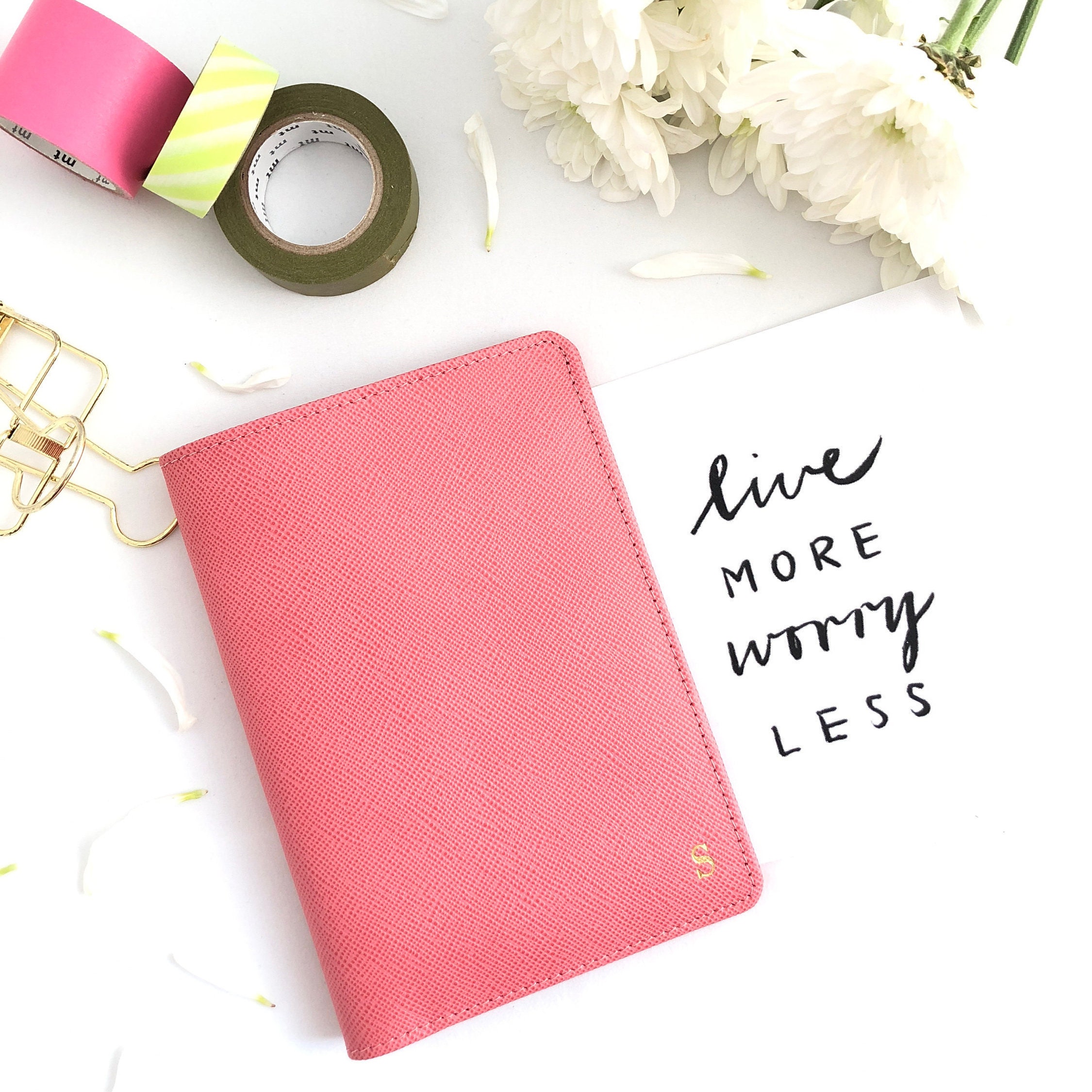 Flamingos. A passport sleeve with a pink flami