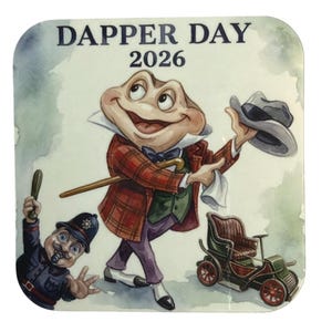 May include: A square coaster featuring the text DAPPER DAY 2026. The illustration depicts a frog wearing a red plaid jacket, green vest, and purple trousers, holding a gray hat. Beside the frog is a small police officer and a vintage car.