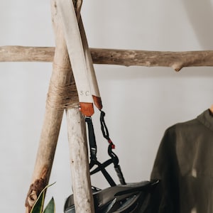 Universal strap for bicycle and scooter helmets