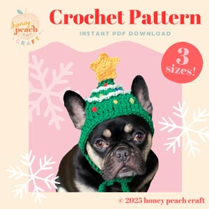 May include: A black and brown dog wearing a green crochet Christmas tree hat with a yellow star on top. The image includes the text "Crochet Pattern" and "3 sizes!" on a pink background with snowflakes.
