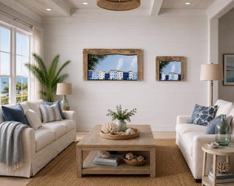 May include: Two rectangular wall mirrors with rustic, weathered wooden frames. The mirrors feature a painted scene of a row of blue and white houses against a blue sky, positioned along the bottom edge of the glass, creating a coastal aesthetic.