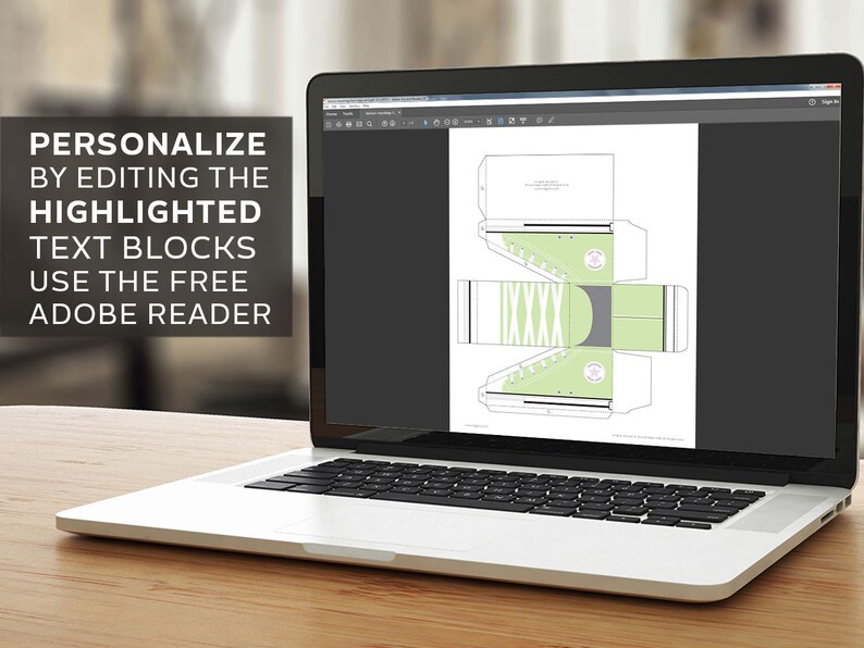 May include: A laptop screen displaying a printable template for a shoe-shaped box. The template is in black and white with green accents. The text on the screen says "PERSONALIZE BY EDITING THE HIGHLIGHTED TEXT BLOCKS USE THE FREE ADOBE READER".