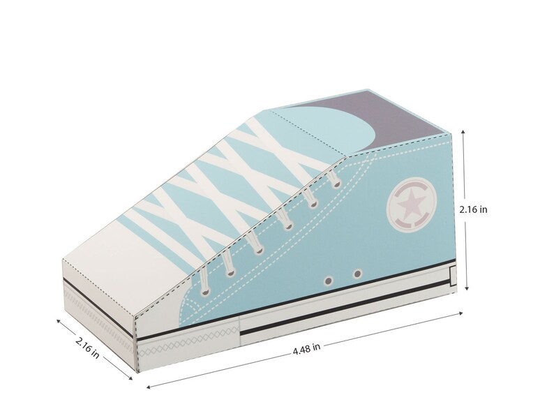 May include: A light blue shoe-shaped box with white laces and a white star on the side. The box measures 4.48 inches long, 2.16 inches wide, and 2.16 inches high.