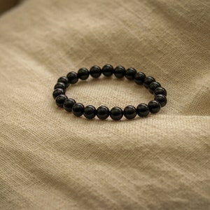 8mm Black Obsidian Bracelet. Psychic Protection, Grounding + Cleansing Negativity. Root Chakra. Black Crystal. Elastic - Stretch Band.