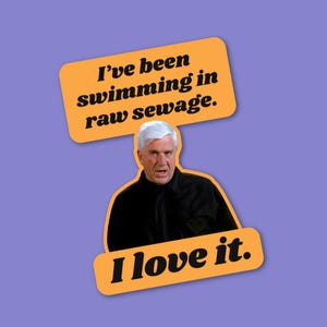 May include: A sticker featuring a man in a black shirt with the text "I've been swimming in raw sewage" above him and "I love it" below. The text is in black on orange rectangles, set against a purple background.