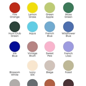 May include: A colour chart displaying 18 different paint colours with their names. The colours are arranged in rows and columns. The colours include Apple Red, Colonial Red, Harvest Peach, Rustic Orange, Fire Orange, Lemon Grass, Green Apple, Moss Green, Hunt Club Green, Aqua, French Blue, Wildflower Blue, Ink Blue, Vintage Blush, Sweet Pea, French Lilac, Blossom White, Ivory Silk, Beige, Fossil, Stone Grey, Granite, Cinnamon, and Espresso. The chart also includes a black circle labelled Canyon Black.