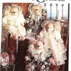 May include: Simplicity Crafts pattern featuring teddy bears in various outfits. The bears are dressed in lace and floral fabrics, with one wearing a top hat. The pattern number is 7815, and it is one size.
