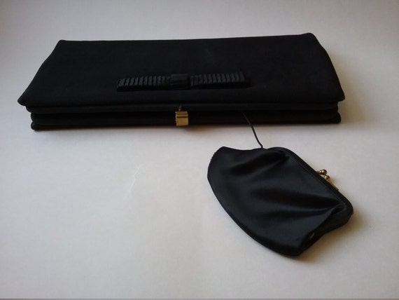 black satin clutch bag