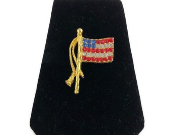 Broche vintage con bandera estadounidense y diamantes de imitación