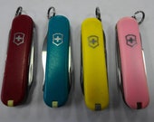 Four Vintage Victorinox Swiss Army Knives Multi Tool Colors Lot 4 each