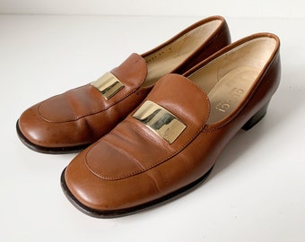 Mocassini Gucci vintage con finiture in metallo dorato