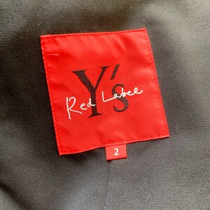 May include: Red label with the text "Y's Red Label" in black on a red background. The number "2" is printed in white on a small white label.
