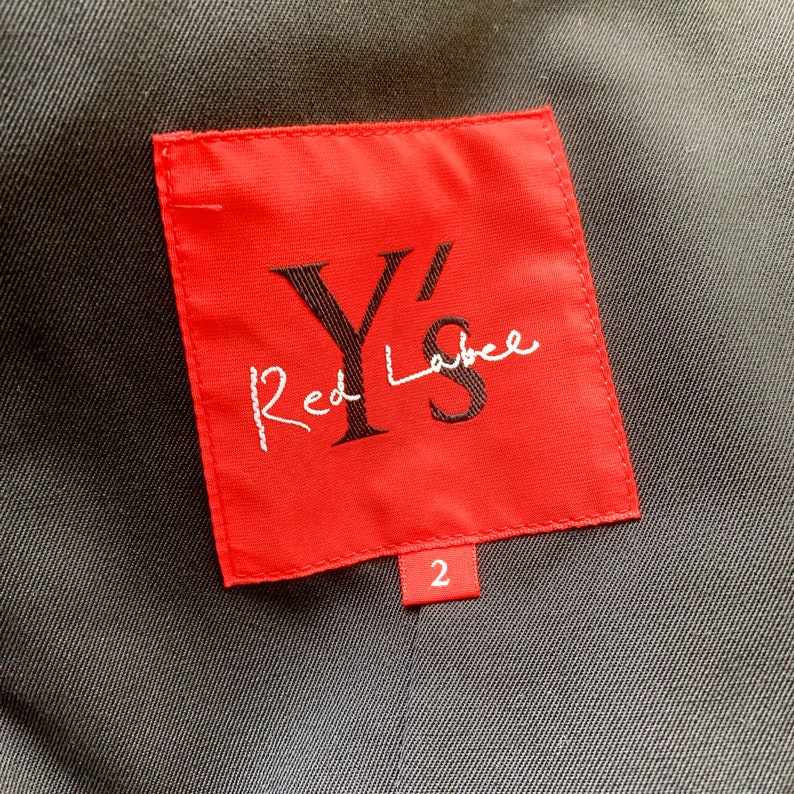 May include: Red label with the text "Y's Red Label" in black on a red background. The number "2" is printed in white on a small white label.