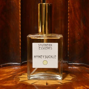 Honeysuckle Perfume -2oz- Made from essential oils extracted from fresh flowers, this sweet fragrance has a hidden surprise. Perfect Gift!